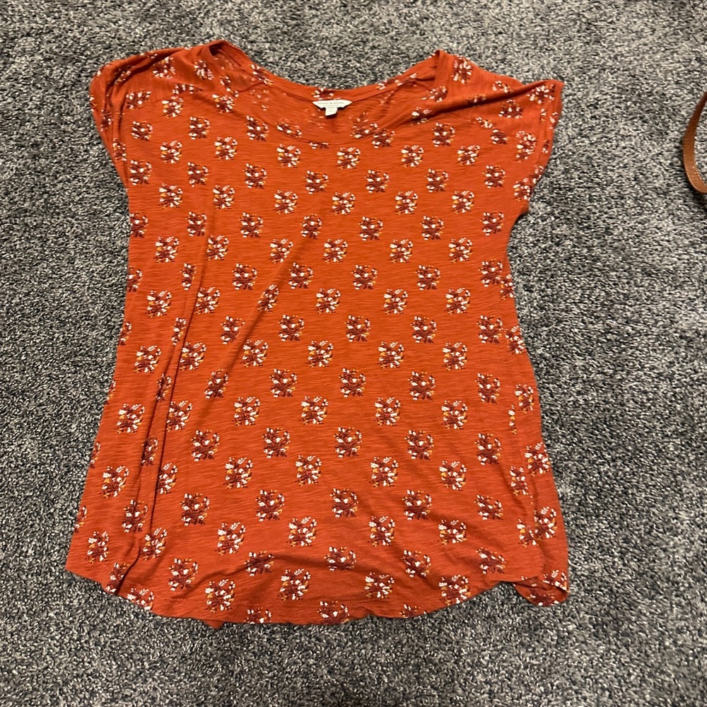 Small orange blouse great for a comfy work shirt